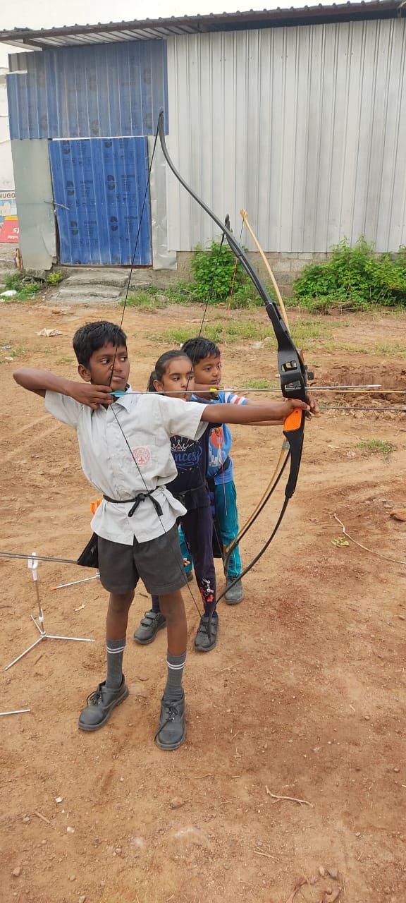 Professional archer aiming